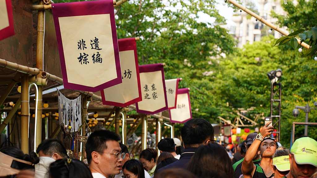 端午民俗文化游火爆 龙舟粽子成旅游新热点